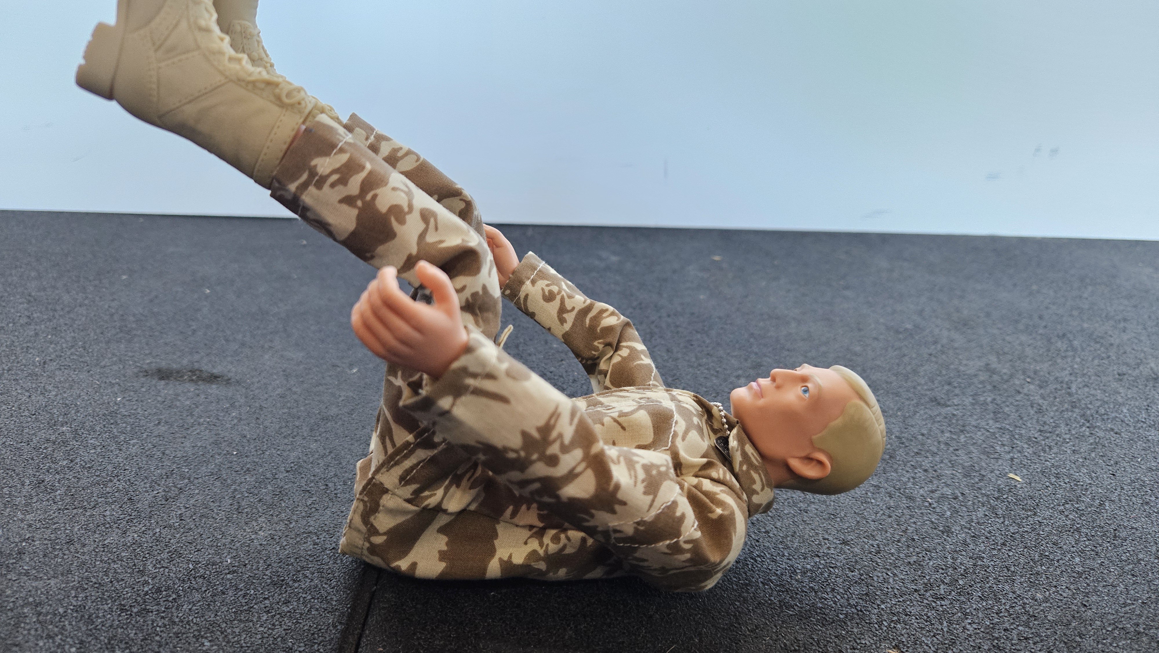 Action Man doing Happy Baby Pose